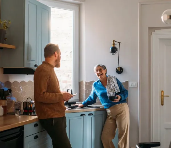 man-and-woman-laughing-in-kitchen.jpg